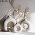 Load image into Gallery viewer, Circular Hollow Ceramic Vase Donuts Nordic Art